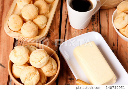 Brazilian breakfast with cheese bread, black coffee, and butter on a rustic table Brazilian breakfast with cheese bread, black coffee, and butter on a rustic table 140739951
