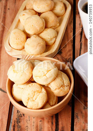 Cheese bread in assorted containers with fresh coffee and butter; ideal for breakfast and regional cuisine themes Cheese bread in assorted containers with fresh coffee and butter; ideal for breakfast and regional cuisine themes 140739953