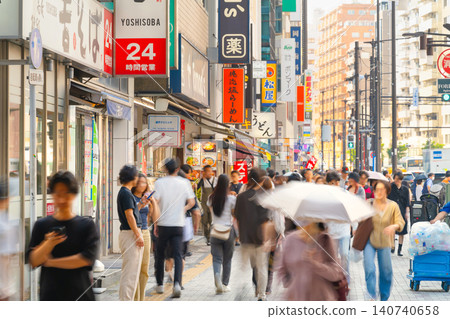 A lively streetscape in front of Nakameguro Station on the Tokyu Toyoko Line in Tokyo. A lively streetscape in front of Nakameguro Station on the Tokyu Toyoko Line in Tokyo. 140740658