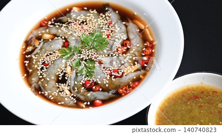 shrimp in soy sauce on white plate, korean style menu shrimp in soy sauce on white plate, korean style menu 140740823