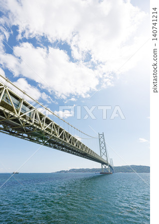 The Akashi Kaikyo Bridge under a clear blue sky of early summer. The Akashi Kaikyo Bridge under a clear blue sky of early summer. 140741214