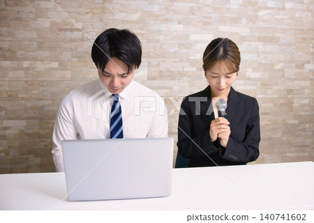 Business seminar: Business person apologizing Business seminar: Business person apologizing 140741602