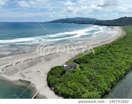 An aerial view of Oki Beach in early summer, overlooking the vast expanse of shallow sand. 140741682