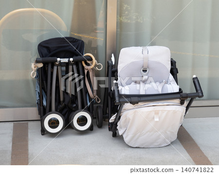 Folded-up strollers lined up Folded-up strollers lined up 140741822