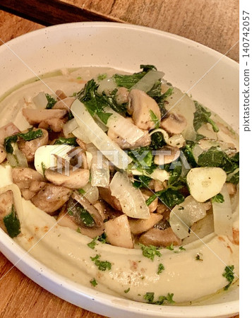 Hummus, a chickpea paste from Middle Eastern cuisine. 140742057
