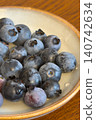 Fresh blueberries and a lovely ceramic bowl 140742634