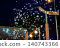 Soap bubbles dancing in the night sky 140743366
