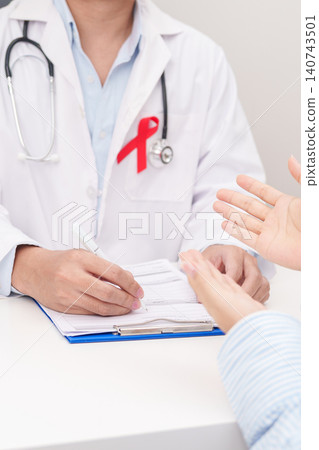 Doctor and patient having a medical consultation for red ribbon concept of December World Aids Day, MADD, October Red ribbon week, February Heart month, Marfan Syndrome, May Stroke awareness Doctor and patient having a medical consultation for red ribbon concept of December World Aids Day, MADD, October Red ribbon week, February Heart month, Marfan Syndrome, May Stroke awareness 140743501