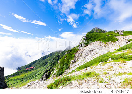 [Mount Kiso-Komagatake] View of the summit of Mt. Hokendake from Norikoshi Jodo 140743647