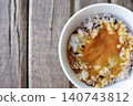Sixteen-grain rice with raw egg: Mixed grain rice topped with a raw egg mixed with soy sauce. 140743812