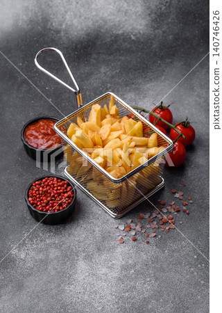Golden French fries fried with salt and spices, unhealthy takeaway food. French fries Golden French fries fried with salt and spices, unhealthy takeaway food. French fries 140746426