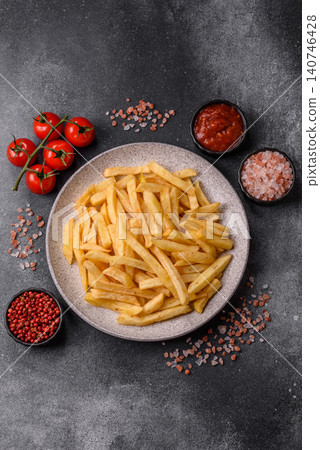 Golden French fries fried with salt and spices, unhealthy takeaway food. French fries Golden French fries fried with salt and spices, unhealthy takeaway food. French fries 140746428