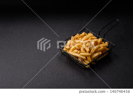Golden French fries fried with salt and spices, unhealthy takeaway food. French fries Golden French fries fried with salt and spices, unhealthy takeaway food. French fries 140746438