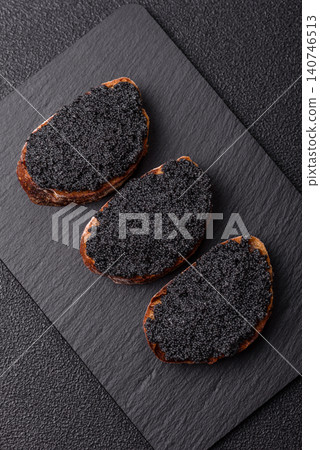 Black caviar from beluga or sturgeon, an expensive delicacy for sandwiches. Black caviar 140746513