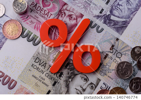 The percentage sign on cash as a concept for inflation, deposits, or tax. The percentage sign 140746774