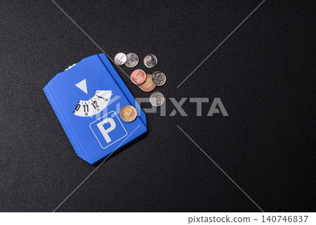 A parking disc, permit, or ticket for measuring time and paying municipal services. A parking disc A parking disc, permit, or ticket for measuring time and paying municipal services. A parking disc 140746837