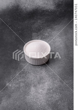 Sweet white sugar as a source of glucose. White sugar Sweet white sugar as a source of glucose. White sugar 140747031