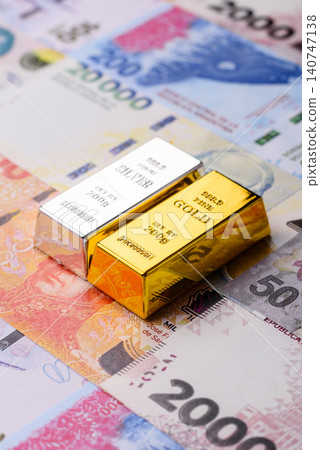 Gold and silver bullion or ingots as metals for bank storage, investments. Gold and silver bars Gold and silver bullion or ingots as metals for bank storage, investments. Gold and silver bars 140747138