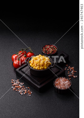 Golden, sweet canned corn kernels or maize for salads and vegetarian dishes. Canned corn Golden, sweet canned corn kernels or maize for salads and vegetarian dishes. Canned corn 140747463