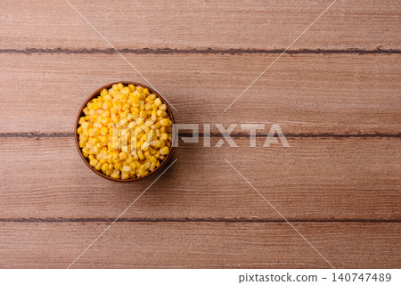Golden, sweet canned corn kernels or maize for salads and vegetarian dishes. Canned corn Golden, sweet canned corn kernels or maize for salads and vegetarian dishes. Canned corn 140747489