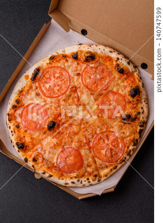 Italian pizza margherita with cheese, tomatoes, and tomato sauce, fast food. Pizza margherita Italian pizza margherita with cheese, tomatoes, and tomato sauce, fast food. Pizza margherita 140747599