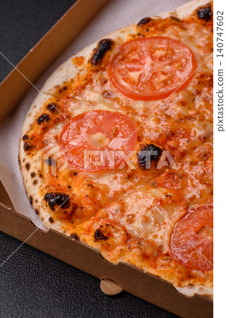 Italian pizza margherita with cheese, tomatoes, and tomato sauce, fast food. Pizza margherita Italian pizza margherita with cheese, tomatoes, and tomato sauce, fast food. Pizza margherita 140747602