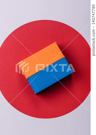 Cargo containers on the japanese flag as a conceptual backdrop. Cargo containers Cargo containers on the japanese flag as a conceptual backdrop. Cargo containers 140747780