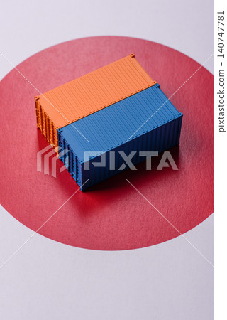 Cargo containers on the japanese flag as a conceptual backdrop. Cargo containers Cargo containers on the japanese flag as a conceptual backdrop. Cargo containers 140747781