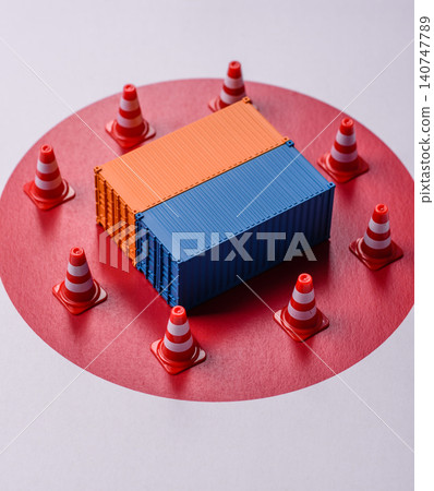 The cargo container ban on the japanese flag as a conceptual backdrop. The cargo container embargo The cargo container ban on the japanese flag as a conceptual backdrop. The cargo container embargo 140747789