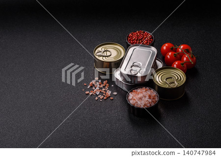A metal tin can of meat, fish, or dog or cat food. A tin can of food A metal tin can of meat, fish, or dog or cat food. A tin can of food 140747984