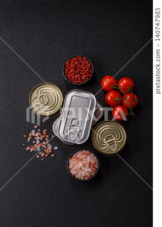 A metal tin can of meat, fish, or dog or cat food. A tin can of food A metal tin can of meat, fish, or dog or cat food. A tin can of food 140747985