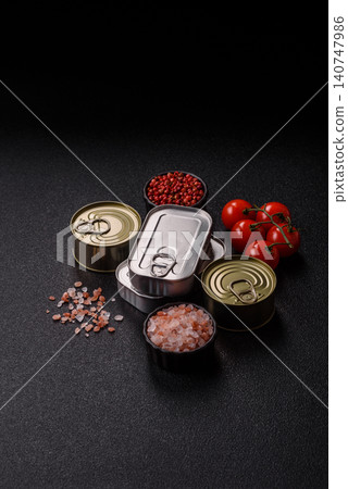 A metal tin can of meat, fish, or dog or cat food. A tin can of food A metal tin can of meat, fish, or dog or cat food. A tin can of food 140747986
