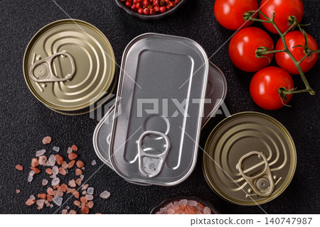 A metal tin can of meat, fish, or dog or cat food. A tin can of food A metal tin can of meat, fish, or dog or cat food. A tin can of food 140747987