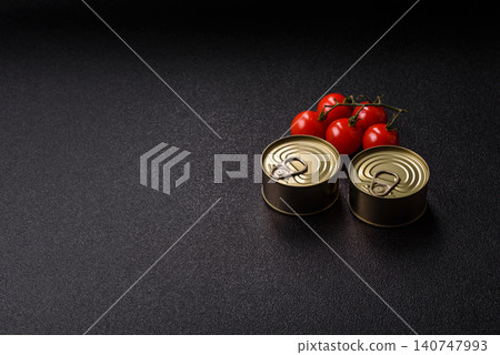 A metal tin can of meat, fish, or dog or cat food. A tin can of food A metal tin can of meat, fish, or dog or cat food. A tin can of food 140747993