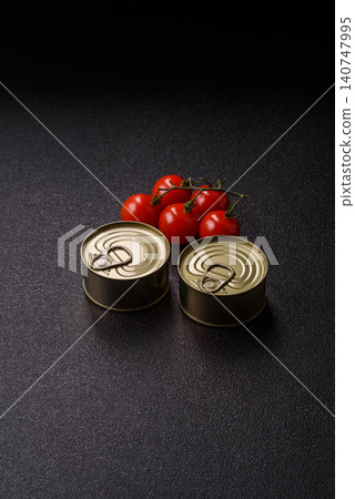A metal tin can of meat, fish, or dog or cat food. A tin can of food A metal tin can of meat, fish, or dog or cat food. A tin can of food 140747995