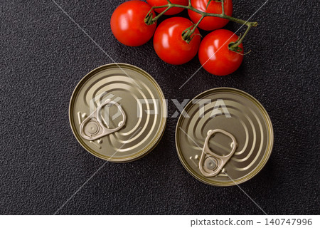 A metal tin can of meat, fish, or dog or cat food. A tin can of food A metal tin can of meat, fish, or dog or cat food. A tin can of food 140747996
