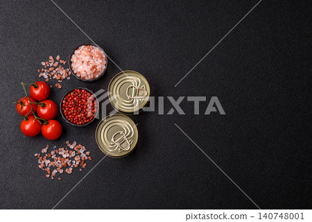 A metal tin can of meat, fish, or dog or cat food. A tin can of food A metal tin can of meat, fish, or dog or cat food. A tin can of food 140748001