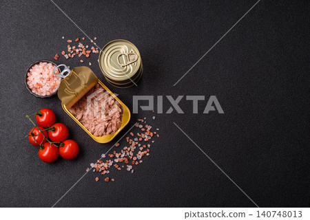 Fish, canned tuna chunks in brine for sandwiches and salads. Canned tuna Fish, canned tuna chunks in brine for sandwiches and salads. Canned tuna 140748013
