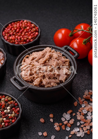 Fish, canned tuna chunks in brine for sandwiches and salads. Canned tuna Fish, canned tuna chunks in brine for sandwiches and salads. Canned tuna 140748061