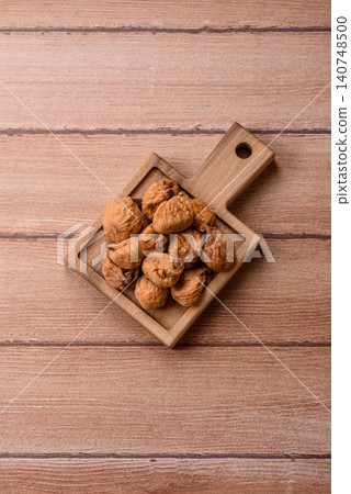 Dried whole fig as an ingredient for sweet desserts. Dried figs as a food 140748500