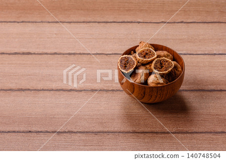Dried whole fig as an ingredient for sweet desserts. Dried figs Dried whole fig as an ingredient for sweet desserts. Dried figs 140748504