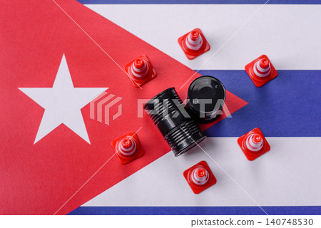 The cargo container ban on the Cuba flag as a conceptual backdrop. The cargo container embargo The cargo container ban on the Cuba flag as a conceptual backdrop. The cargo container embargo 140748530