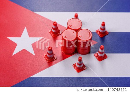 The cargo container ban on the Cuba flag as a conceptual backdrop. The cargo container embargo The cargo container ban on the Cuba flag as a conceptual backdrop. The cargo container embargo 140748531