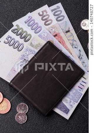 Czech koruna, paper money and coins, financing and commodity exchange, trade. Czech currency Czech koruna, paper money and coins, financing and commodity exchange, trade. Czech currency 140748727
