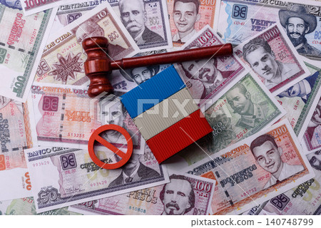 The cargo container ban on the Cuba flag as a conceptual backdrop. The cargo container embargo The cargo container ban on the Cuba flag as a conceptual backdrop. The cargo container embargo 140748799