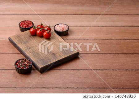 Empty wooden cutting board for preparing ingredients for home cooking. An empty cutting board 140748920