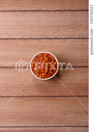 Beans in tomato sauce, a canned stew for the dinner table. Beans in tomato sauce Beans in tomato sauce, a canned stew for the dinner table. Beans in tomato sauce 140748921