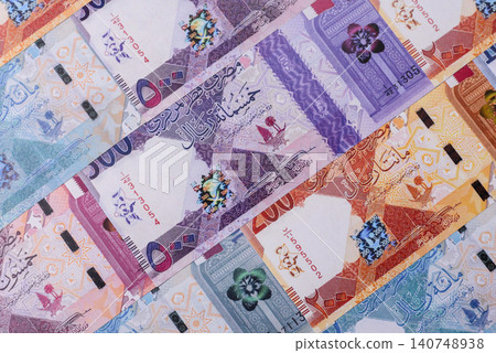 Qatar paper money, the Qatari riyal as a tool for financial transactions and trade. Qatari money 140748938