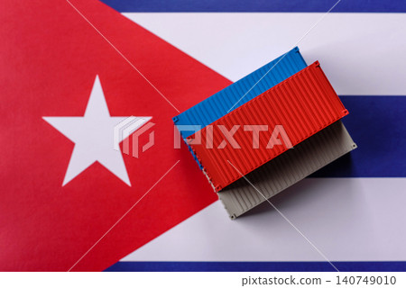 Cargo containers on the Cuba flag as a conceptual backdrop for goods export. Cargo containers Cargo containers on the Cuba flag as a conceptual backdrop for goods export. Cargo containers 140749010