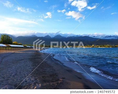 At the beach in the evening At the beach in the evening 140749572